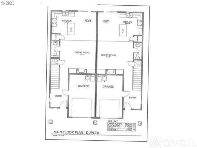 A floor plan of a duplex apartment with two garages and two great rooms.