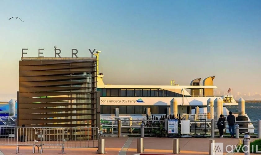 A large building with a sign that says "FERRY" in front of it.