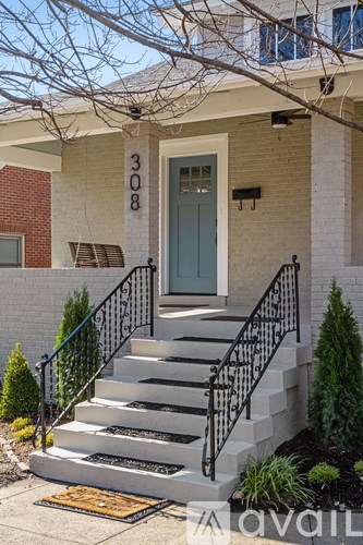 A house with the number 308 on the front.