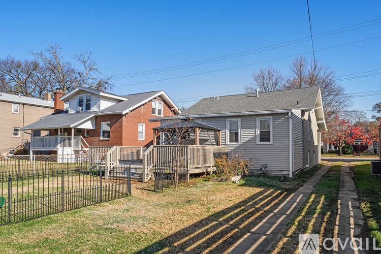 A house with a fence in front of it.