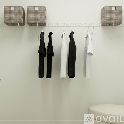 A row of clothes hanging on a clothesline.