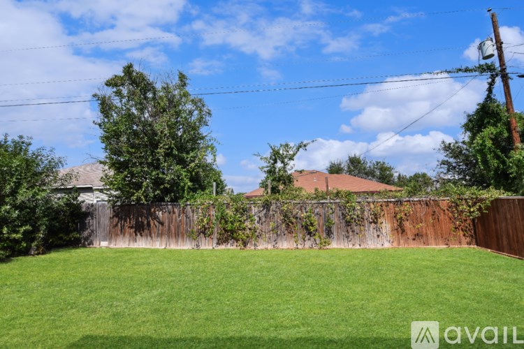 A house with a covered patio is for sale.