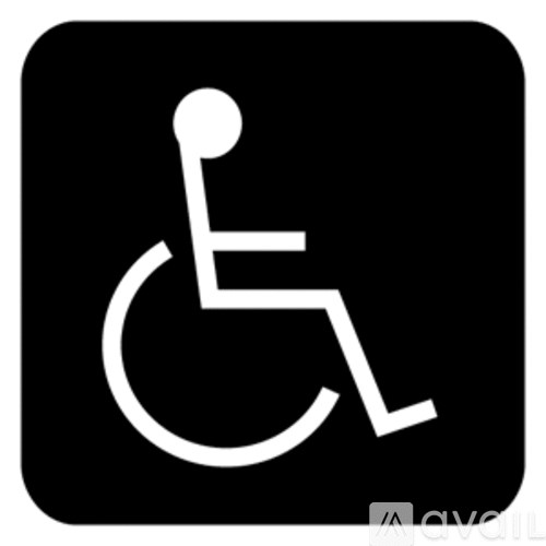 A black and white image of a wheelchair symbol.