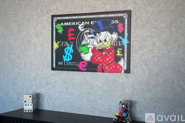 A framed poster of a cartoon character surrounded by currency symbols with the words "NO LIMITS" written below.