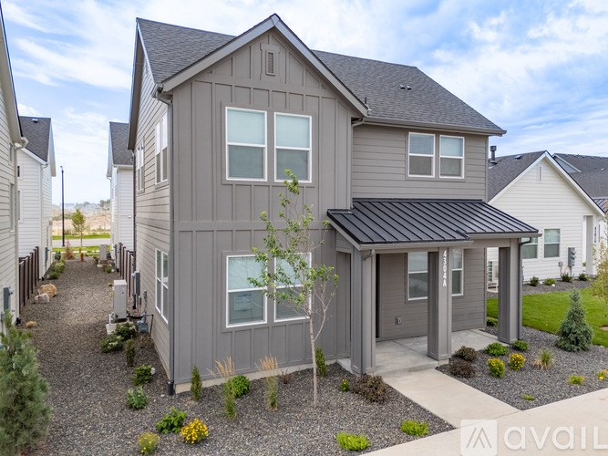 A bathroom with a white sink and a mirror.