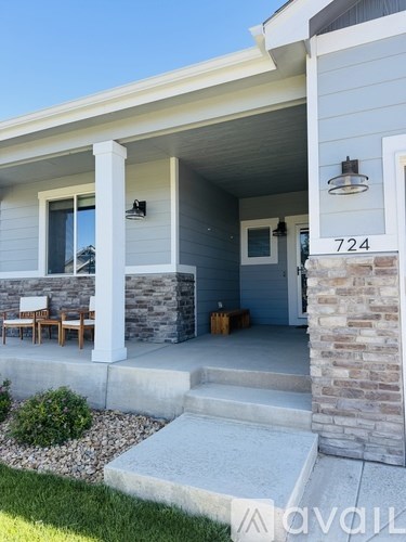 A house with the number 724 on the front door.