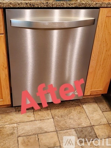 A stainless steel dishwasher in a kitchen.