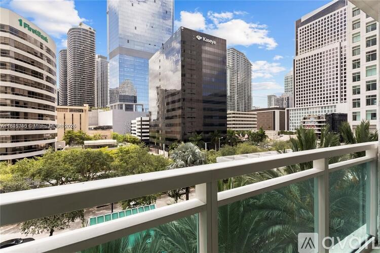A cityscape with a bridge in the foreground.