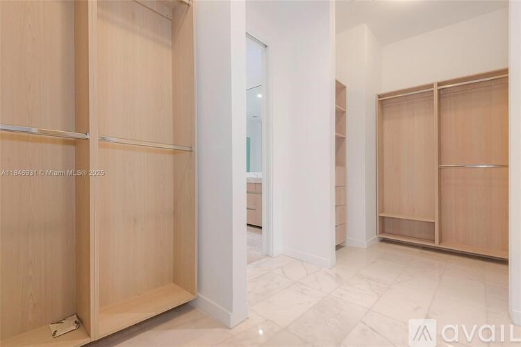 Closed wooden doors in a room.