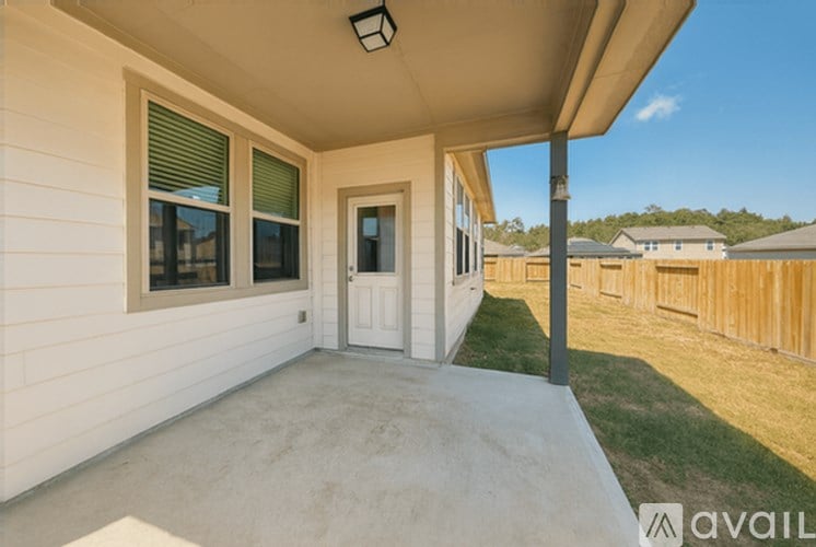 A house with a white door and window is for sale.