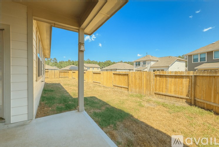 A view from a house looking out to a row of houses.