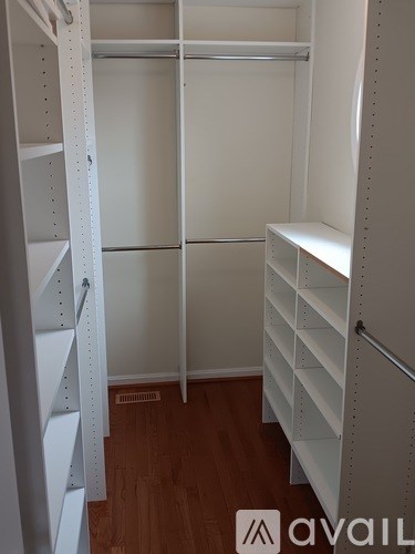 A white shelving unit with a logo that reads "avail" on the bottom right.