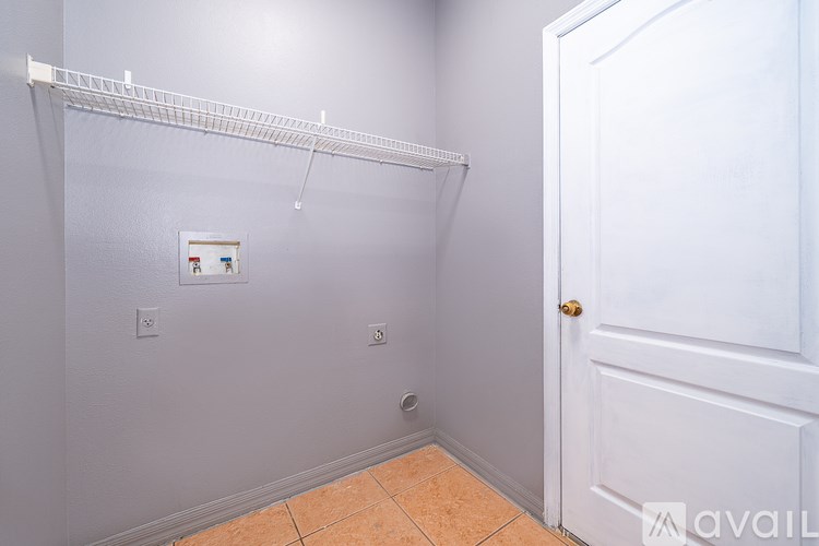 A white door is on the right side of the image.