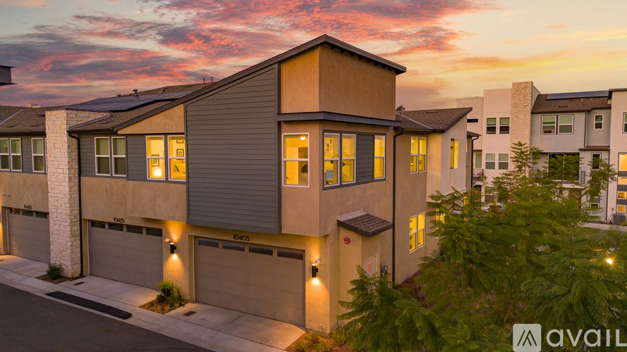 A modern house with a garage is available for sale.