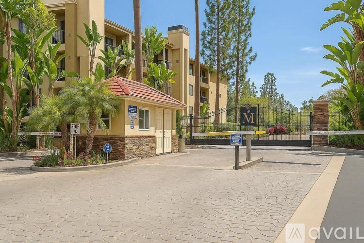 A building with a sign that says "STOP" in front of it.