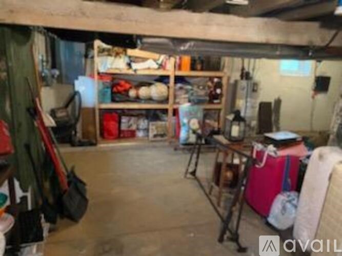 A room with a lot of clutter and various items scattered about.