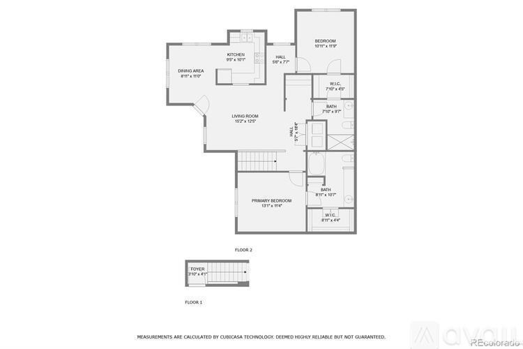 A floor plan of a two-story house with a living room, dining area, kitchen, and bathrooms.