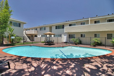 our apartments have a large pool and a patio
