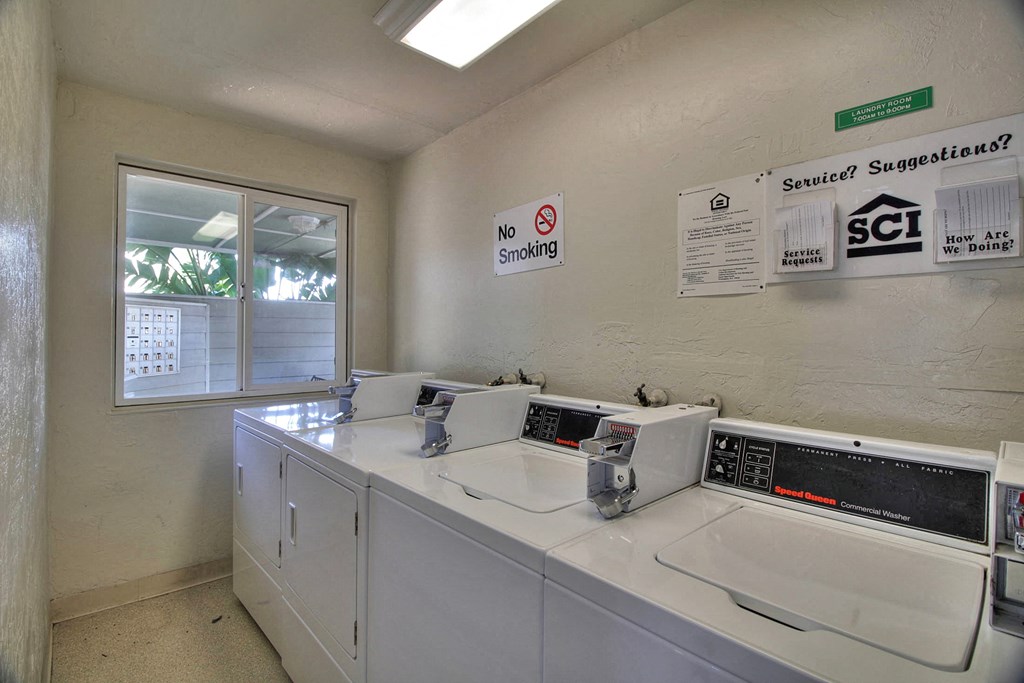 A laundromat with a no smoking sign.