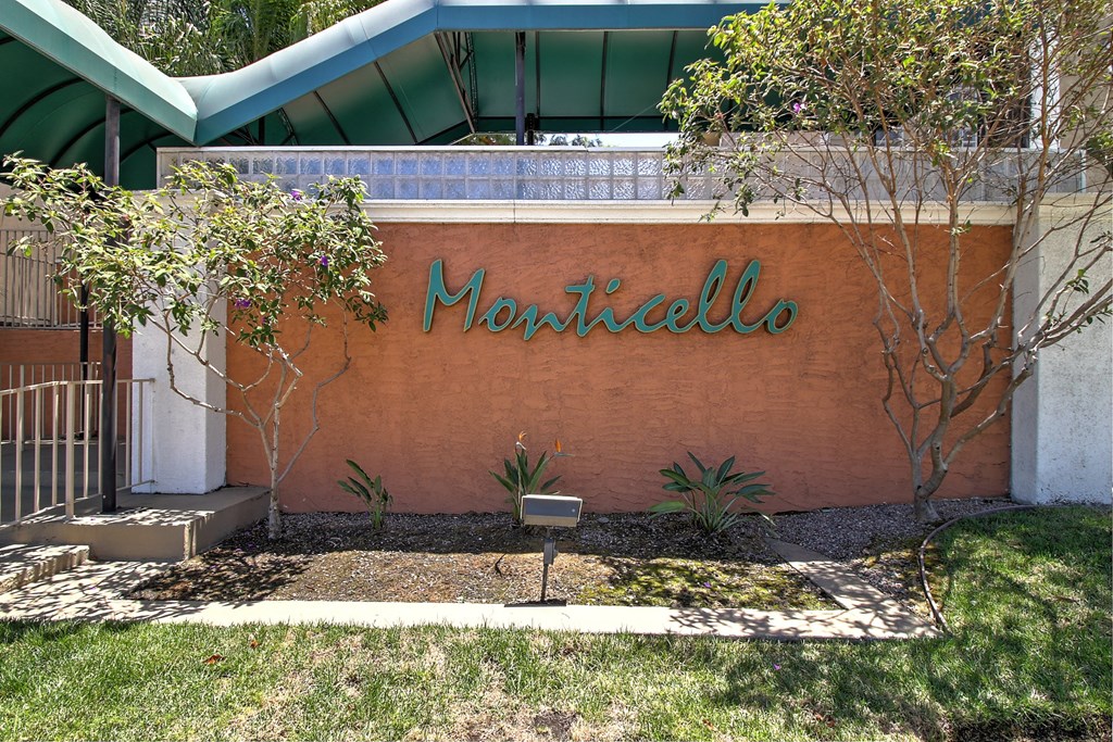 A Monticello sign is on a building.