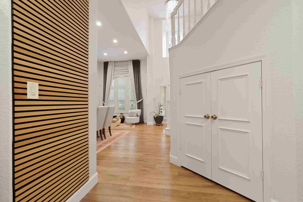 A white door is on the right side of the image.