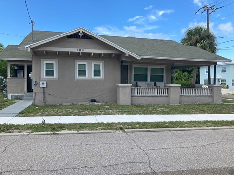 A house with the number 509 on the roof.