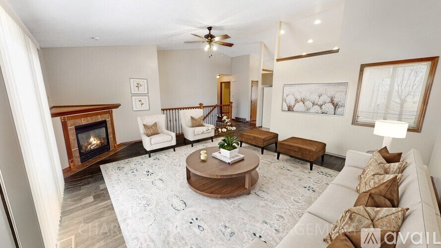 A living room with a fireplace and a couch.