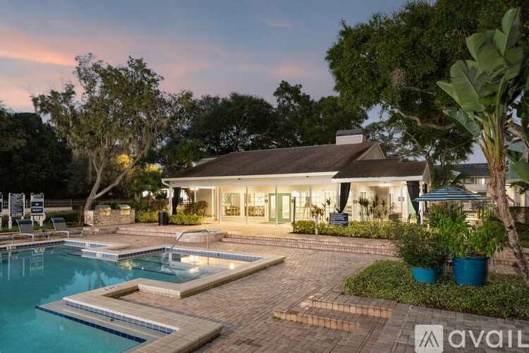 A house with a pool in the backyard is available for rent.