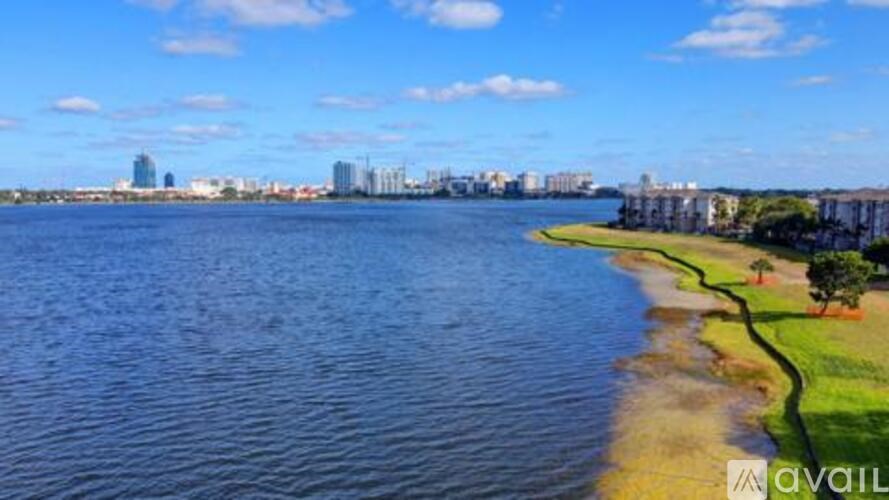 A cityscape with a river running through it.