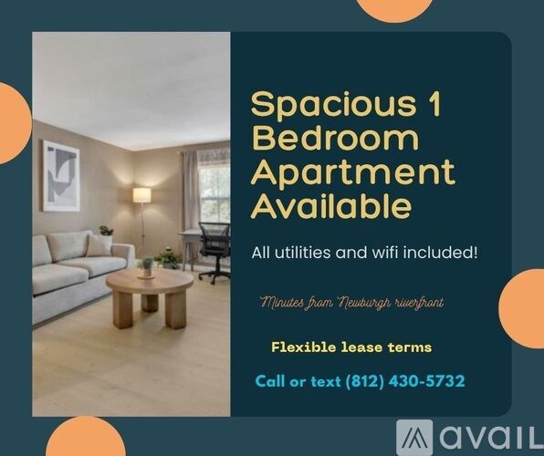 A room with a sofa, a chair, and a table is advertised as a spacious 1 bedroom apartment available.