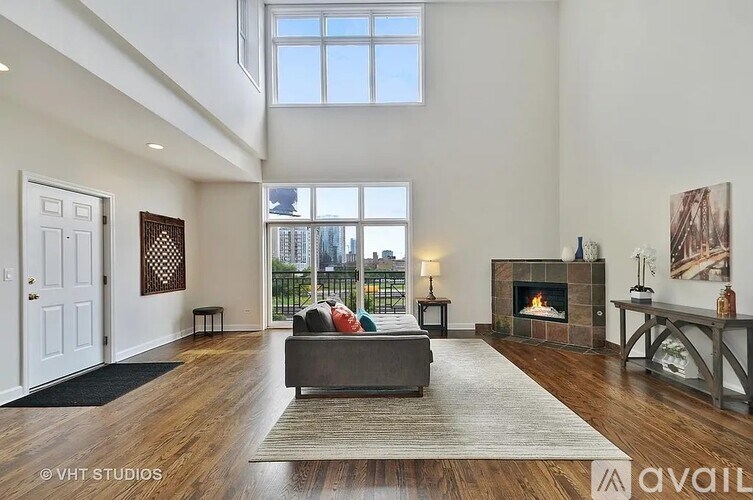 A living room with a fireplace and a couch.