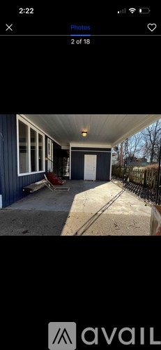 A photo gallery app showing the second photo of 18 photos.