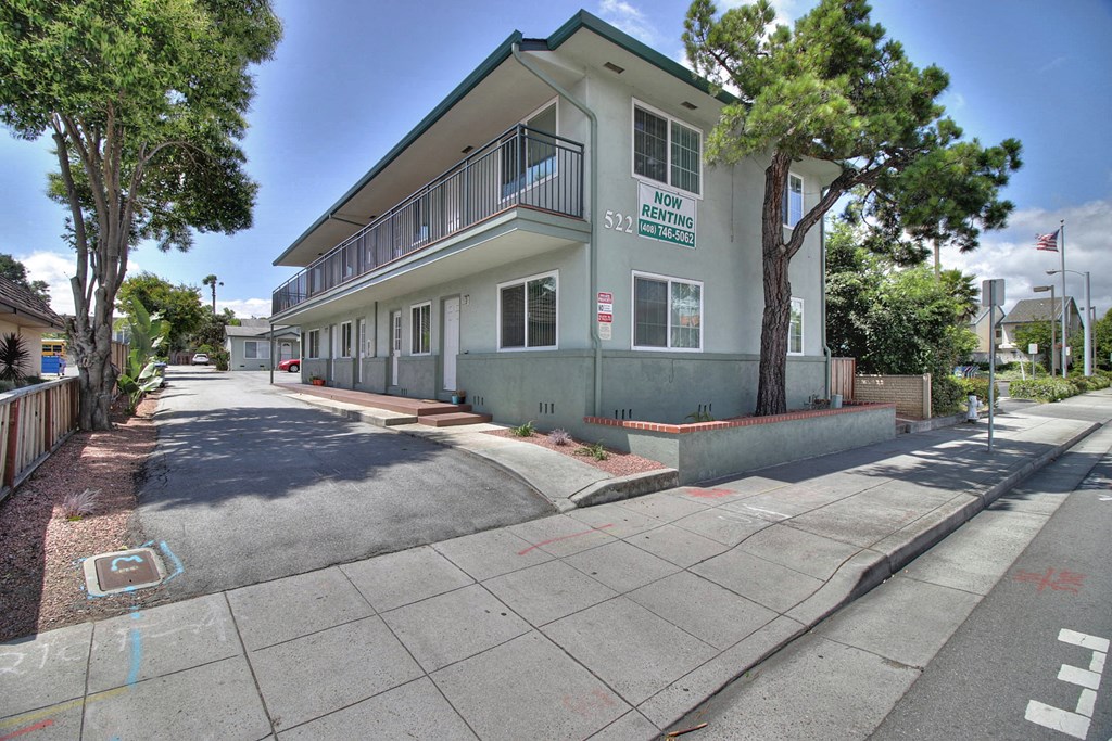 A street view of a building with the sign