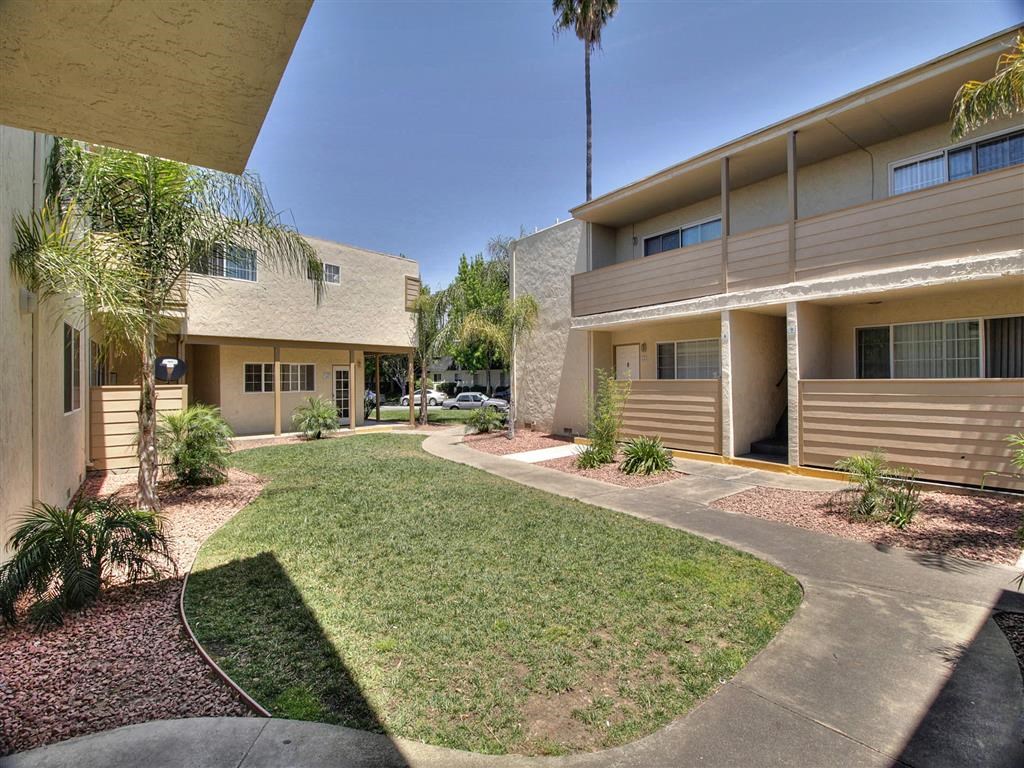 A sunny day at the courtyard of a residential building.