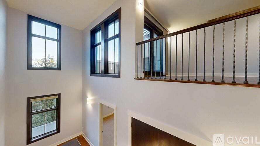 A room with a staircase leading to the second floor.