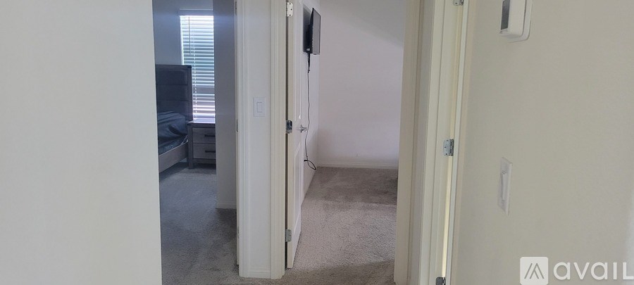 A room with a bed and a couch in it.