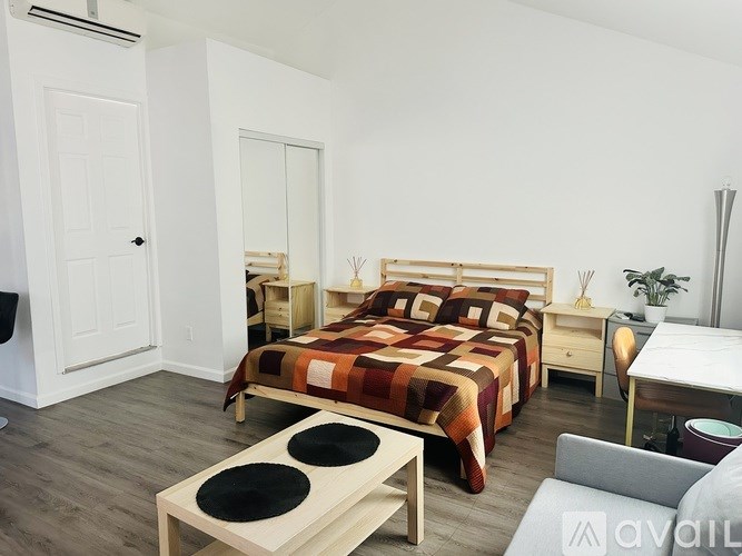 A pool with a unicorn float in it.