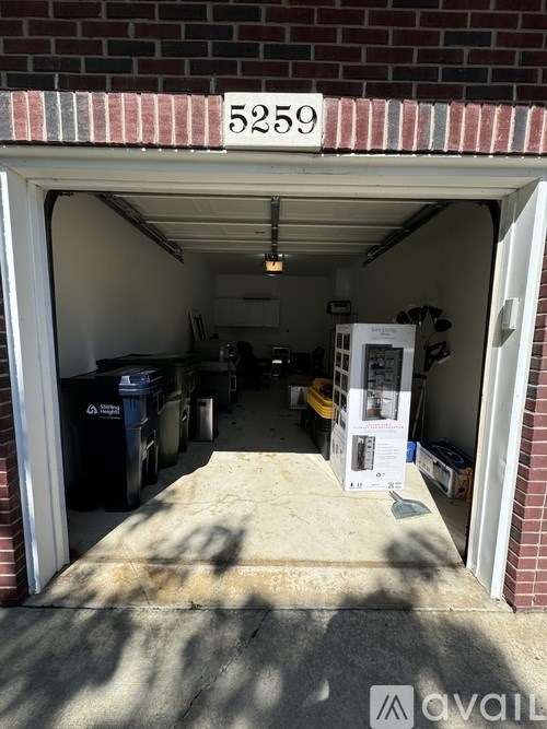 A garage with the number 5259 on the wall.