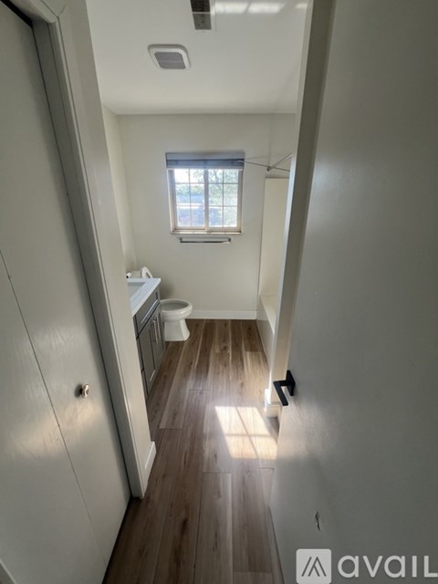 A small bathroom with a toilet and sink.