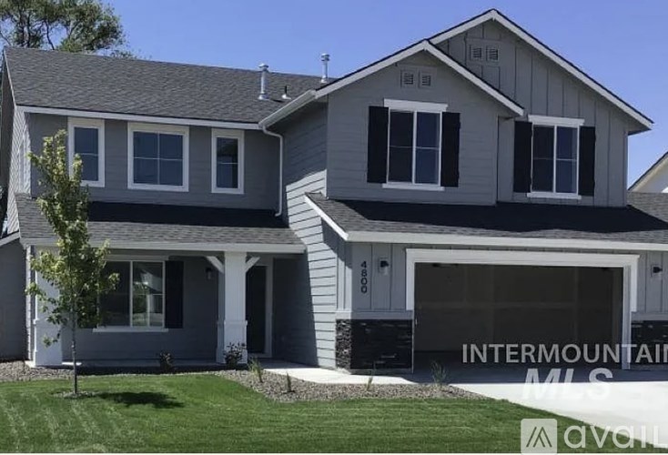 A two-story house with a garage is for sale in Intermountain.