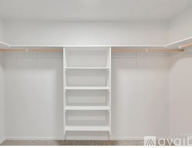 A white ladder is leaning against a wall in a room.