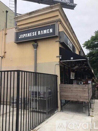 A Japanese Ramen restaurant is located in a shopping plaza.