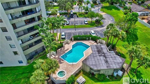 A house with a pool in the backyard.