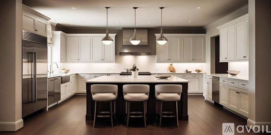 A modern kitchen with a center island and pendant lights.