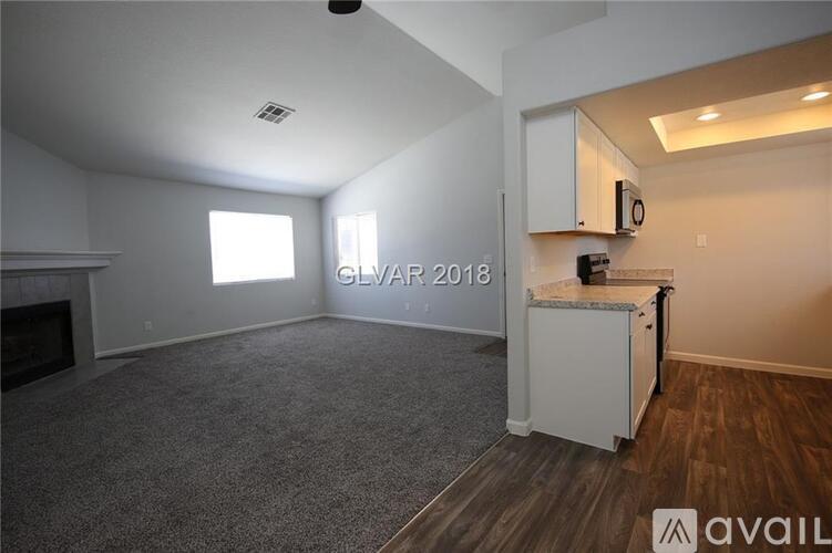 A room with a fireplace and a kitchenette is available for rent in 2018.