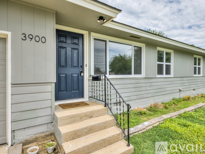 A house with the number 3900 on the front door.