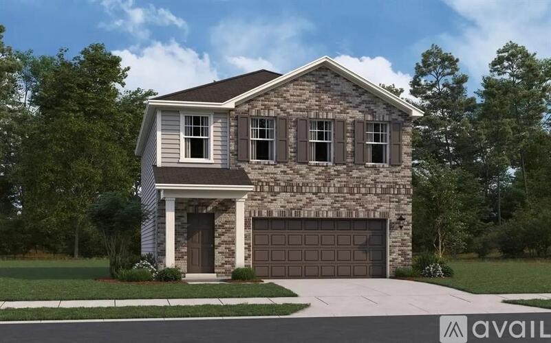 A house with a stone facade and a brown garage door.