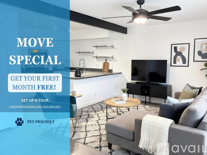 A living room with a grey couch and a kitchen area in the background, with text advertising a move-in special.