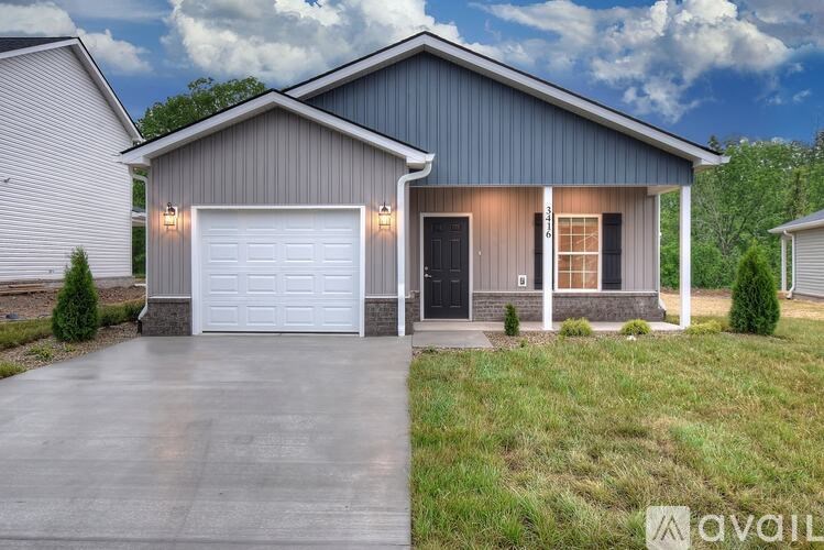 A modern house with a garage is available for sale.