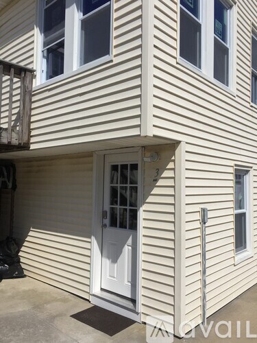 A house with a white door and windows.